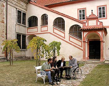 A Brainstorming Session in front of the Monastery Monastery of Ritters of Crusaders order with red star, foto: Lubor Mrázek 